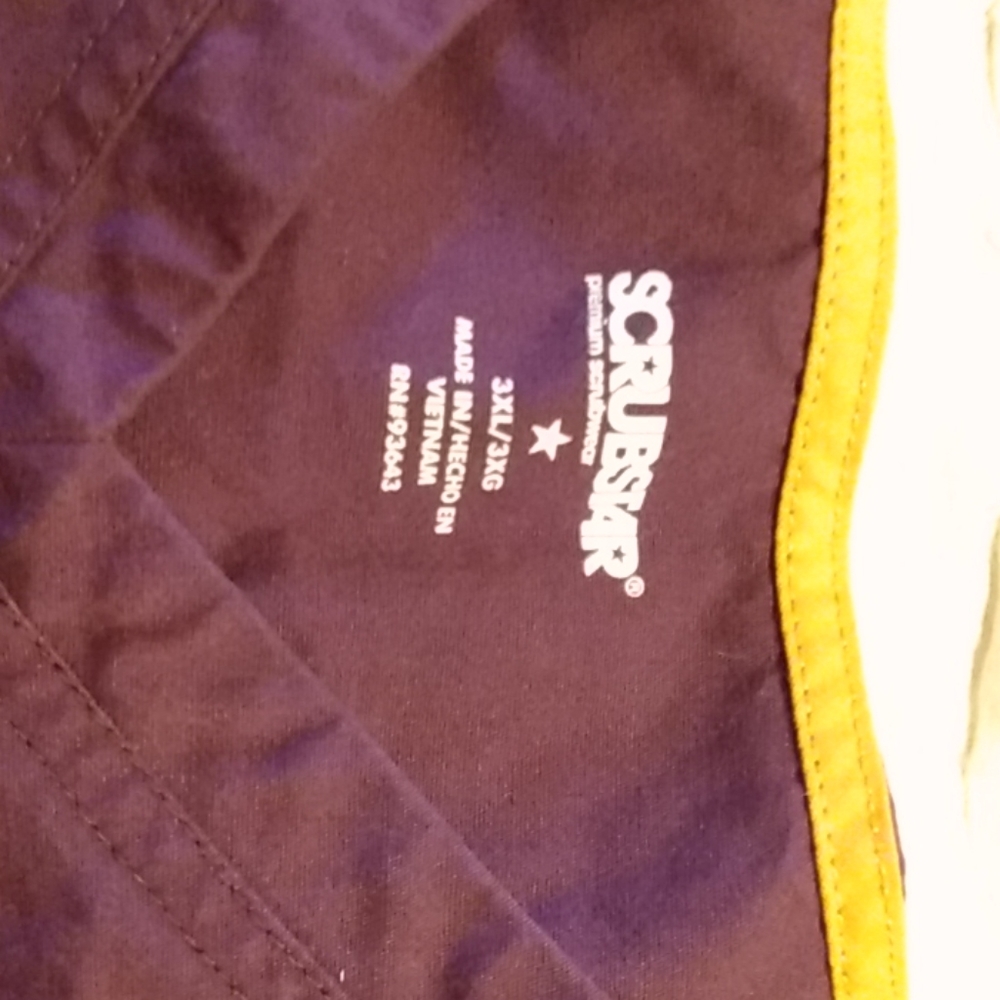 The top is 3ZL. And the bottom draw string pants a